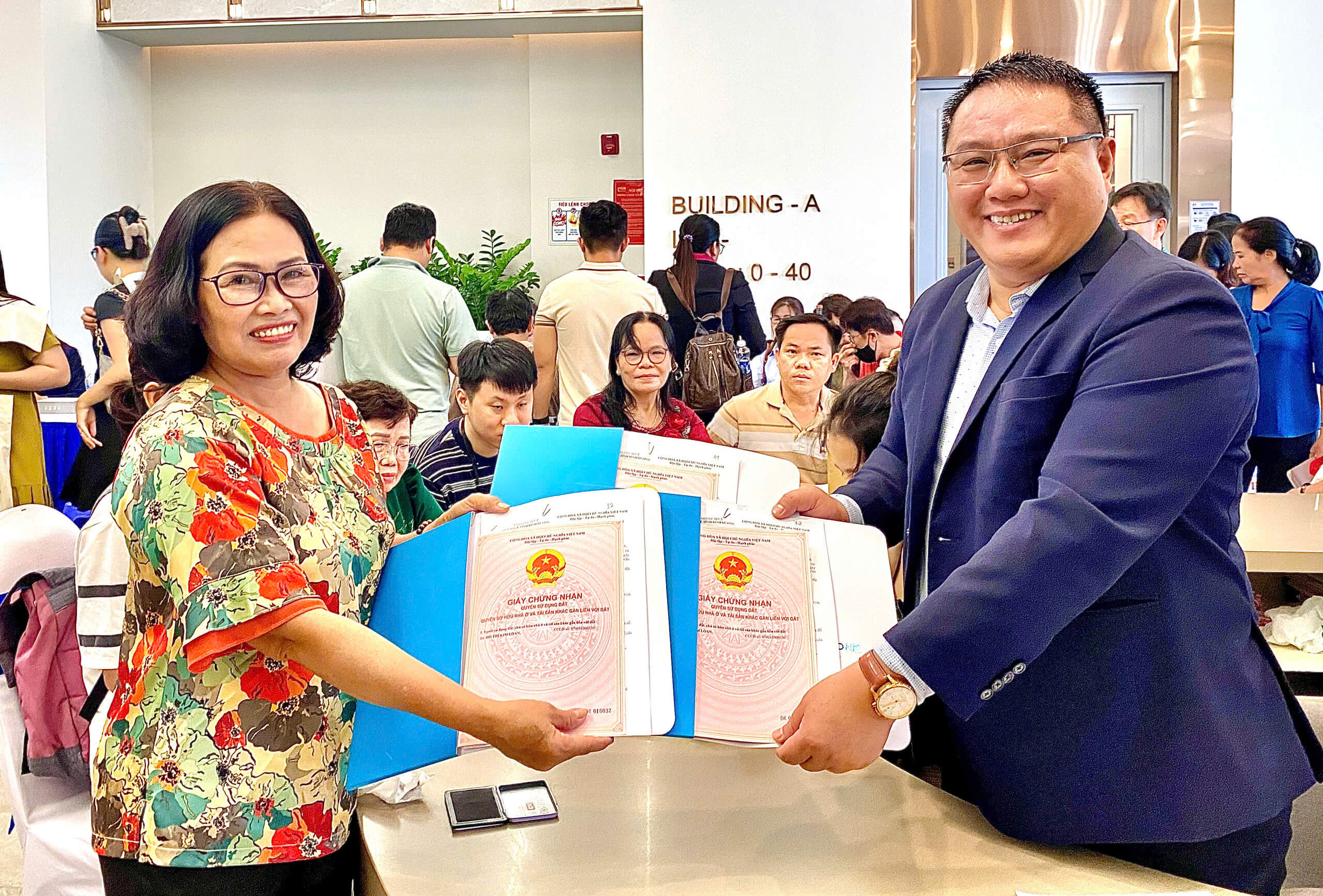 vạn xuân group cấp sổ happy one central